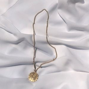 Gold necklace Virgin Mary